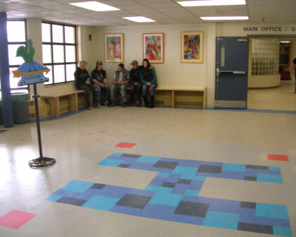 New lobby floor, benches, and art display system